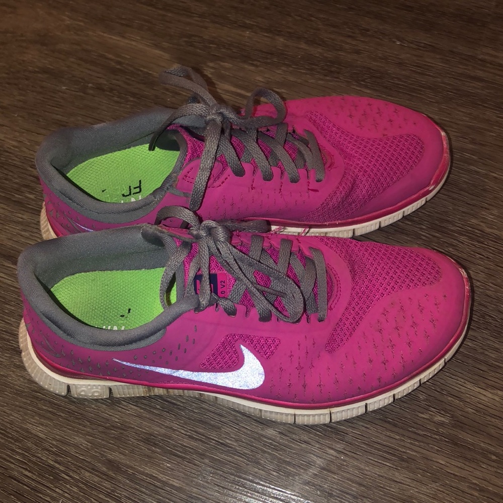 Pink Nike Free tennis shoes